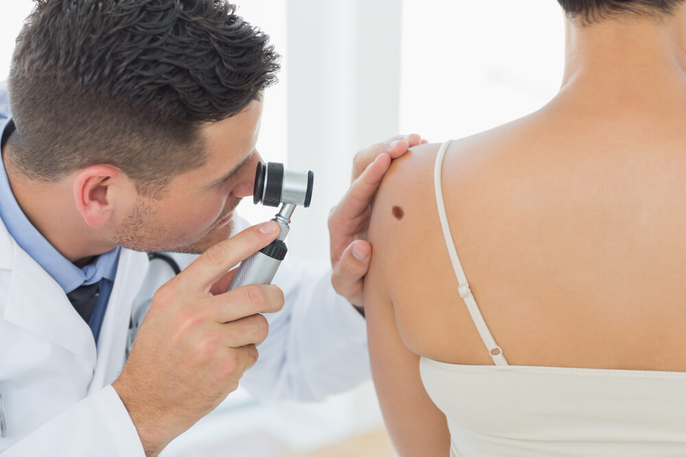 The 10 Best Dermatology Clinics In Calgary 2024   Doctor Examining Mole Back Woman 1 